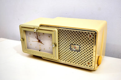 SOLD! - Feb 5, 2020 - Palace Ivory and Gold 1959 Bulova Model 120 Tube AM Clock Radio Excellent Condition!