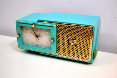 SOLD! - Feb 5, 2020 - Faberge Turquoise and Gold 1957 Bulova Model 100 AM Clock Radio Near Mint and Simply Fabulous!