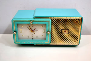 SOLD! - Feb 5, 2020 - Faberge Turquoise and Gold 1957 Bulova Model 100 AM Clock Radio Near Mint and Simply Fabulous! - [product_type} - Bulova - Retro Radio Farm