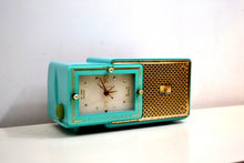 Load image into Gallery viewer, SOLD! - Feb 5, 2020 - Faberge Turquoise and Gold 1957 Bulova Model 100 AM Clock Radio Near Mint and Simply Fabulous! - [product_type} - Bulova - Retro Radio Farm