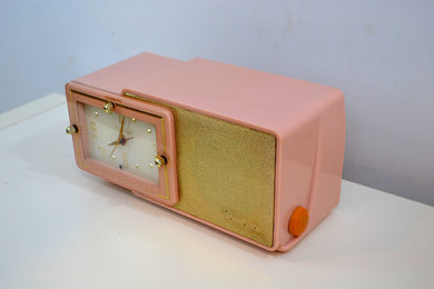 SOLD! - Mar 10, 2019 - Pink Gold 1959 Bulova Model 100 Tube AM Antique Clock Radio