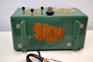 SOLD! -Nov 22, 2019 - Mariner Green 1954 General Electric Model 566 Retro AM Clock Radio Porthole Design Sounds Great! - [product_type} - General Electric - Retro Radio Farm