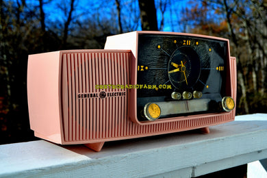 SOLD! - Jan. 5, 2018 - ROSE PINK Mid Century Jetsons 1959 General Electric Model 915 Tube AM Clock Radio Totally Restored!