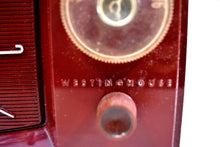 Load image into Gallery viewer, Burgundy Red 1959 Westinghouse Model H545T5A Vintage Tube AM Clock Radio Totally Restored!