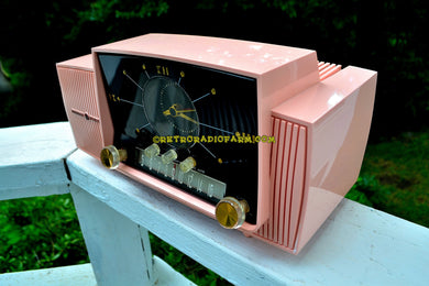 SOLD! - July 17, 2017 - COUPE DE VILLE PINK Mid Century Jetsons 1959 General Electric Model 915 Tube AM Clock Radio Totally Restored!