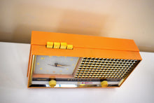 Load image into Gallery viewer, Buff Pink Retro Space Age 1957 Sylvania Model 1322 Tube AM Clock Radio Sounds Great!