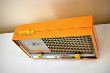 Load image into Gallery viewer, Buff Pink Retro Space Age 1957 Sylvania Model 1322 Tube AM Clock Radio Sounds Great!