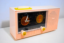 Load image into Gallery viewer, Buffy Pink 1959 Admiral Y3564 Vintage Atomic Age Vacuum Tube AM Radio Clock Mid Century Nightstand!
