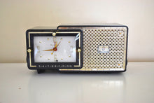 Load image into Gallery viewer, Luxor Black and Gold 1959 Bulova Model 100 AM Vacuum Tube Radio Rare Model Superb Sounding Bling Bling!