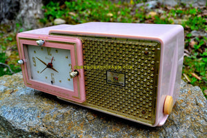 SOLD! - May 4, 2017 - FIFTH AVENUE PINK Mid Century Retro Jetsons 1957 Bulova Model 120 Tube AM Clock Radio Excellent Condition!