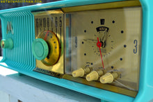 Load image into Gallery viewer, SOLD! - Apr 27, 2017 - VIVID Turquoise Retro Jetsons 1957 Motorola 57CC Tube AM Clock Radio Totally Restored! - [product_type} - Motorola - Retro Radio Farm