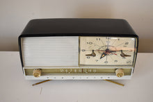 Load image into Gallery viewer, Black and White 1959 RCA Victor Model C-4FE Vacuum Tube AM Clock Radio Unique Swivel Stand
