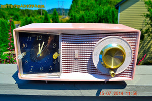 SOLD! - Aug 2, 2014 - MID-CENTURY MARVEL Pink Retro Jetsons Late 50's early 60's Motorola C23P Tube AM Clock Radio WORKS!