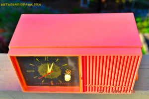 SOLD! - Jan 9, 2015 - HOT PINK Retro Jetsons Vintage 1957 Truetone Western Auto Supply Model DC2852 AM Tube Clock Radio - [product_type} - Truetone - Retro Radio Farm