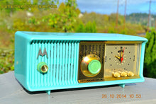 Load image into Gallery viewer, SOLD! - Nov 28, 2014 - VIVID Turquoise Retro Jetsons 1957 Motorola 57CC Tube AM Clock Radio WORKS! - [product_type} - Motorola - Retro Radio Farm