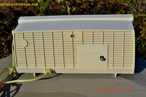 SOLD! - Feb 4, 2015 - PRINCESS PINK and White Retro Jetsons Vintage 1957 RCA Victor Model C-2FE AM Tube Radio WORKS! - [product_type} - RCA Victor - Retro Radio Farm