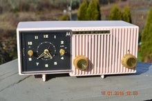 Load image into Gallery viewer, SOLD! - Jan 31, 2015 - LUSCIOUS PINK Retro Jetsons 1956 Motorola 57CF Tube AM Clock Radio WORKS! - [product_type} - Motorola - Retro Radio Farm