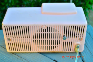 SOLD! - July 21, 2015 POWDER PINK Mid Century Jetsons 1959 General Electric Model C-406A Tube AM Clock Radio Totally Restored! - [product_type} - General Electric - Retro Radio Farm