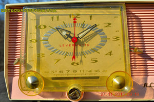 SOLD! - Dec 14, 2015 - BLUETOOTH MP3 READY - Pink and White Retro Jetsons Vintage 1957 RCA C-4FE AM Tube Clock Radio Totally Restored! - [product_type} - RCA Victor - Retro Radio Farm