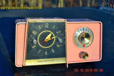 SOLD! - Mar 24, 2016 - POWDER PINK Mid Century Jetsons 1959 General Electric Model C-406A Tube AM Clock Radio Works Great Some Issues