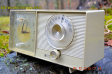 Load image into Gallery viewer, SOLD! - Feb 20, 2016 - OLIVE TAUPE Mid Century Jetsons 1959 General Electric Model C-305A Tube AM Clock Radio Totally Restored! - [product_type} - General Electric - Retro Radio Farm