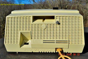 SOLD! - Feb 20, 2016 - PINK and White Retro Jetsons Vintage 1957 RCA C-4FE AM Tube Clock Radio Totally Restored! - [product_type} - RCA Victor - Retro Radio Farm