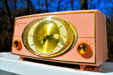 SOLD! - Oct 22, 2016 - PINK CYCLOPIC Vintage Mid Century Retro Jetsons 1957 Bulova Model 140 Tube AM Clock Radio WORKS!