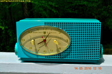 Load image into Gallery viewer, SOLD! - May 24, 2016 - BLUETOOTH MP3 READY - Turquoise Mid Century Retro Jetsons 1956 Sylvania Model 6006 Tube AM Clock Radio Totally Restored! - [product_type} - Sylvania - Retro Radio Farm