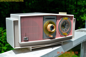 SOLD! - May 30, 2016 - BLUETOOTH MP3 READY - Cotton Candy Pink Retro Jetsons 1963 Motorola Model C19P23 Tube AM Clock Radio Totally Restored! - [product_type} - Motorola - Retro Radio Farm