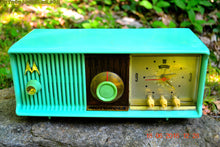 Load image into Gallery viewer, SOLD! - Nov 29, 2017 - SEA GREEN Never-Before-Seen-Never-Knew-Existed Retro Jetsons 1957 Motorola 57CC Tube AM Clock Radio Totally Restored! - [product_type} - Motorola - Retro Radio Farm