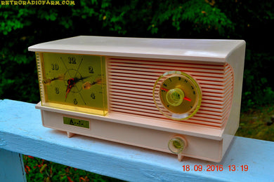 SOLD! - Sept 26, 2016 - POWDER PINK Vintage Antique Mid Century 1961 Arvin Model 51R23 Tube AM Clock Radio Restored and Rare!