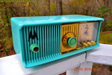Load image into Gallery viewer, SOLD! - Dec 13, 2016 - VIVID Turquoise Retro Jetsons 1957 Motorola 57CC Tube AM Clock Radio Totally Restored! - [product_type} - Motorola - Retro Radio Farm