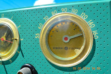 Load image into Gallery viewer, SOLD! - August 29, 2014 - BEAUTIFUL Turquoise Retro Jetsons 1956 General Electric 566 Tube AM Clock Radio - [product_type} - General Electric - Retro Radio Farm