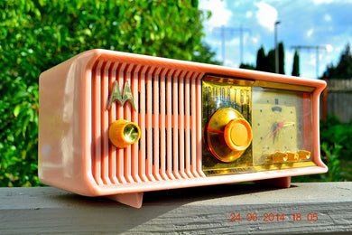 SOLD! - July 3, 2014 - PRETTY IN PINK Retro Jetsons 1957 Motorola 57CC Tube AM Clock Radio WORKS!