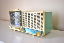 Load image into Gallery viewer, Aquamarine Turquoise and White Mid Century Vintage 1960 General Electric C-450A AM Vacuum Tube Clock Radio Push Button Craze!