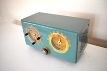 Load image into Gallery viewer, Mariner Green 1954 General Electric Model 566 AM Vacuum Tube Clock Radio Porthole Design Sounds and Looks Great!