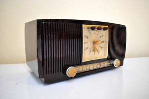 マーブル スワール バーガンディ ブラウン 1954 ゼネラル エレクトリック モデル 577 AM 真空管ラジオのサウンドは素晴らしいです。珍しいカレンダー時計！