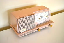 Load image into Gallery viewer, Dusty Pink 1958 General Electric Model C421A Vacuum Tube AM Clock Radio Excellent Condition Sounds Great!