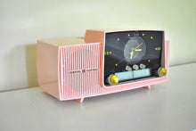 Load image into Gallery viewer, Princess Pink Mid Century 1957 General Electric Model 913D Vacuum Tube AM Clock Radio Beauty Sounds Fantastic!