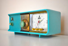 Load image into Gallery viewer, Aquamarine Turquoise 1957 Motorola Model 57CC Vacuum Tube AM Clock Radio Beautiful Color Sounds Fantastic!