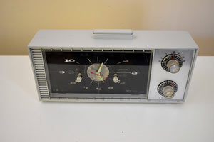 レイス シルバー ミッドセンチュリー レトロ 1957 オリンピック モデル ? AM真空管時計ラジオの音がすごい超レアなネオン光る時計！