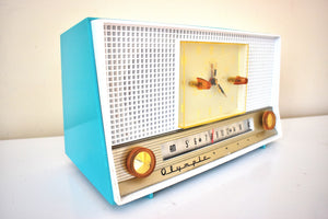 オーシャン ターコイズ 1959 オリンピック モデル 555 真空管 AM クロック ラジオ 希少な美しい色のサウンドは素晴らしいです。