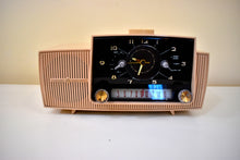 Load image into Gallery viewer, Pastel Pink 1957 General Electric Model 913D Vacuum Tube AM Clock Radio Excellent Plus Condition!