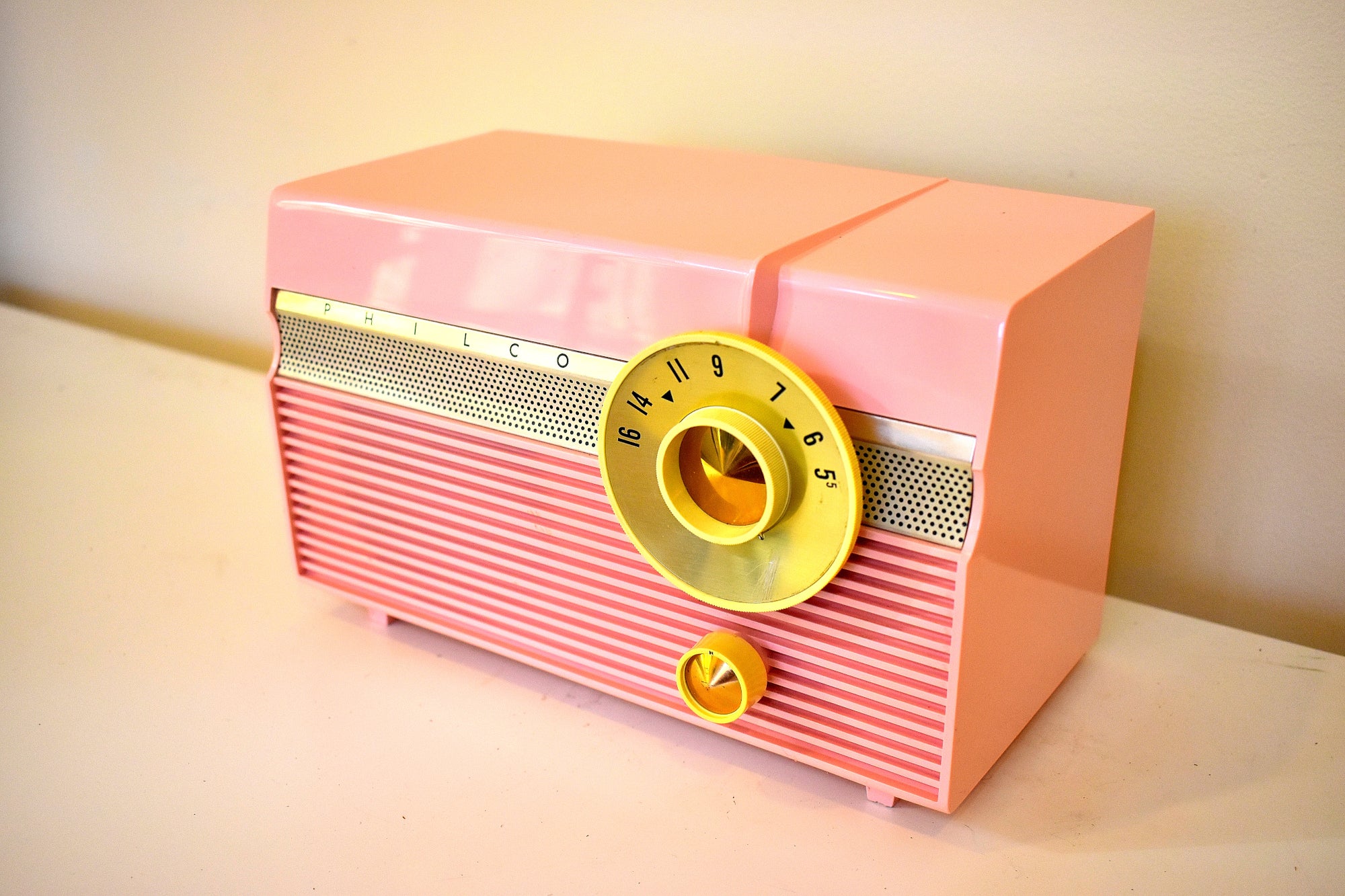 Vintage pink philco tube AM popular Radio