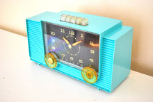 Load image into Gallery viewer, Laguna Turquoise 1959 Philco Model G755-124 Vacuum Tube AM Clock Radio Push Button Mania!