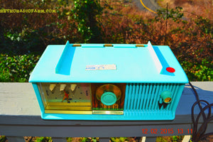 SOLD! - Feb 21, 2016 - VIVID Turquoise Retro Jetsons 1957 Motorola 57CC Tube AM Clock Radio Totally Restored! - [product_type} - Motorola - Retro Radio Farm