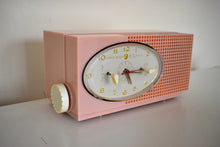 Load image into Gallery viewer, Dolly Pink Retro Space Age 1957 Sylvania Model 6002 Vacuum Tube AM Clock Radio Looks and Sounds Great!
