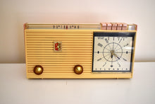 Load image into Gallery viewer, Savoy Pink 1959 Sylvania Model 2305TU Vacuum Tube AM Clock Radio Top Line No Expense Spared Model!