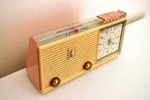 Load image into Gallery viewer, Savoy Pink 1959 Sylvania Model 2305TU Vacuum Tube AM Clock Radio Top Line No Expense Spared Model!