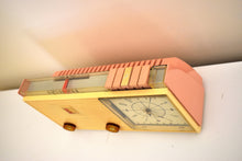 Load image into Gallery viewer, Savoy Pink 1959 Sylvania Model 2305TU Vacuum Tube AM Clock Radio Top Line No Expense Spared Model!